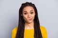 Photo of young attractive afro woman think confused hmm hesitate questioned isolated over grey color background