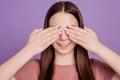 Photo of young attractive brown hair girl hands close cover eyes isolated over violet background Royalty Free Stock Photo