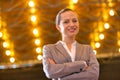 Young attractive businesswoman standing with arms crossed Royalty Free Stock Photo