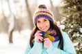 Photo of young attractive cheerful woman happy positive smile walk winter forest woods wear colorful scarf Royalty Free Stock Photo