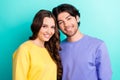 Photo of young attractive couple happy positive smile embrace lovers isolated over teal color background Royalty Free Stock Photo