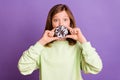 Photo of young attractive girl cover lips donut dessert yummy food sugar isolated over purple color background