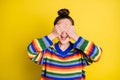 Photo of young attractive girl happy smile excited hands cover eyes isolated over yellow color background