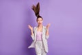 Photo of young attractive happy positive businesswoman with flying hair see big sale discount isolated on purple color Royalty Free Stock Photo