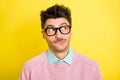Photo of young attractive serious thoughtful minded man in glasses look copyspace thinking isolated on yellow color Royalty Free Stock Photo