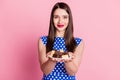 Photo of young attractive woman happy positive smile hold plate chocolate candy sugar diet isolated over pastel color Royalty Free Stock Photo