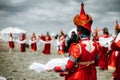 Photo of young beautiful women wearing in traditional national mongolian kalmykian dresses in the festival. Royalty Free Stock Photo