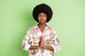 Photo of young black girl unhappy upset ask beg please wish expect wait over green color background