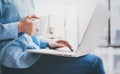 Photo young business woman working with new startup project in office. Modern notebook holding hands, cup of coffee