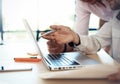 Photo young businessmans crew working with new startup project in modern loft. Generic design notebook on wood table Royalty Free Stock Photo