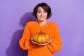 Photo of young charming lady hold pumpkin veggies bio dish tasty isolated over violet color background Royalty Free Stock Photo