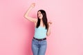 Photo of young cheerful girl happy positive smile have fun dance party isolated over pastel color background Royalty Free Stock Photo