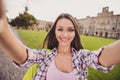 Photo of young cheerful girl happy positive smile make selfie travel trip weekend university park outdoors Royalty Free Stock Photo