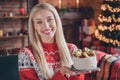 Photo of young cheerful girl happy positive smile new year spirit cake yummy sugar tasty sweet indoors Royalty Free Stock Photo