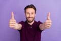 Photo of young cheerful guy show thumbs-up good perfect ideal select suggest rate isolated over violet color background