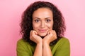 Photo of young cheerful happy afro american woman hold hands face smile enjoy isolated on pink color background Royalty Free Stock Photo