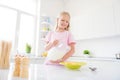 Photo of young cheerful small girl happy positive smile lunch eat crispy muesli dairy healthy food indoors