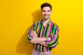 Photo of young confident businessman in exclusive expensive striped shirt folded arms waiting moment isolated yellow Royalty Free Stock Photo