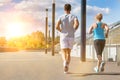Young couple excersising in park Royalty Free Stock Photo