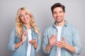 Photo of young couple happy positive smile applauding hands celebrate congrats success isolated over grey color