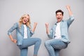 Photo of young couple happy positive smile rejoice celebrate victory success isolated over grey color background