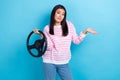 Photo of young dissatisfied korean taxi driver woman wear striped jumper shrug shoulders no idea where new car isolated Royalty Free Stock Photo