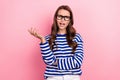 Photo of young dissatisfied woman wear sailor style striped shirt argue conflict with colleagues stress isolated on pink