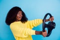 Photo of young driver girl taxi worker need money car crash fast speed isolated on blue color background