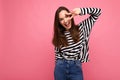 Photo of young european positive smiling winsome happy beautiful brunette woman with sincere emotions wearing casual Royalty Free Stock Photo