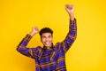 Photo of young excited afro man happy positive smile have fun dance isolated over yellow color background Royalty Free Stock Photo