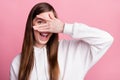 Photo of young excited girl happy positive smile close fingers eyes look see spy isolated over pastel color background