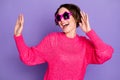 Photo of young excited girl happy positive smile have fun enjoy music dance wear sunglass isolated over violet color Royalty Free Stock Photo