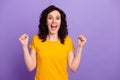 Photo of young excited lovely woman rejoice victory success sale isolated over violet color background