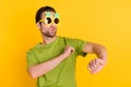 Photo of young excited man have fun dance eyewear club journey isolated over yellow color background Royalty Free Stock Photo