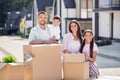 Photo of young family mommy daddy child positive smile enjoy relocation buy purchase new house apartment urban dream Royalty Free Stock Photo