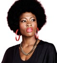 Portrait of young fashionista african american woman wearing red earrings