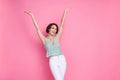 Photo of young funky attractive pretty woman hands up throw invisible things good mood festive girl isolated on pink Royalty Free Stock Photo