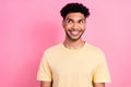 Photo of young funny dude student look side empty space interested wear summer yellow shirt isolated pink color Royalty Free Stock Photo