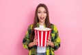 Photo of young funny girl hold eating pop corn have fun chill entertainment serials crazy moment watching serials Royalty Free Stock Photo