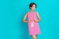 Photo of young girl checkered dress posing candid blogger wear stylish trend hanging phone case isolated on aquamarine