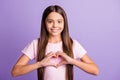 Photo of young girl happy positive smile show fingers heart sign feelings valentine day isolated over violet color