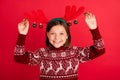 Photo of young girl happy positive smile wear headband reindeer balls christmas spirit isolated over red color