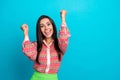 Photo of young girl hispanic brunette raised fists up celebrating black friday shopping week announcement isolated on