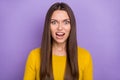 Photo of young girl negative furious scream horrifying try to scare isolated over violet color background