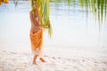 Photo young girl relaxing on beach. Smiling woman spending chill time outdoor Bali island. Summer Season Caribbean Ocean Royalty Free Stock Photo