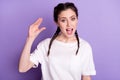Photo of young girl show finger bla blah sign mocking enough talk isolated over purple color background