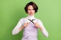 Photo of young girl unhappy negative crossed fork knife diet calories food dislike isolated over green color background