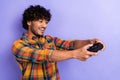 Photo of young guy arab wear trendy stylish shirt holding wireless gamepad addicted playing new fifa 23 isolated on Royalty Free Stock Photo