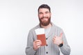 Photo of young handsome man with beard showing thumbs up Royalty Free Stock Photo