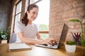 Photo of young happy cheerful good mood businesswoman boss remote working in laptop computer at home house